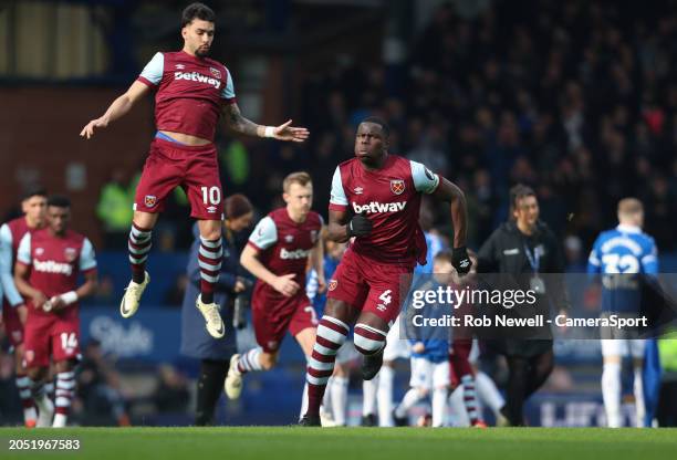 West Ham United's Kurt Zouma leads his side onto the pitch during the Premier League match between Everton FC and West Ham United at Goodison Park on...