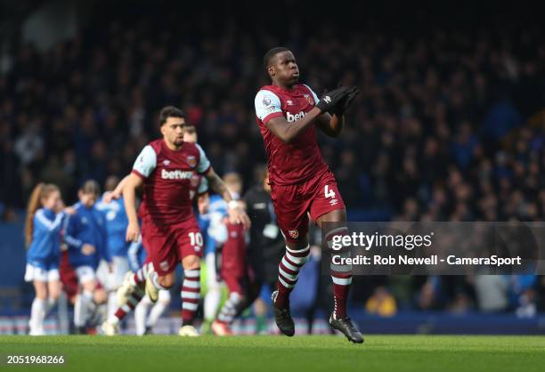 West Ham United's Kurt Zouma applauds the fans after leading his side out onto the pitch during the Premier League match between Everton FC and West...