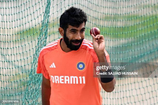 India's Jasprit Bumrah prepares to ball at the nets during a practice session at the Himachal Pradesh Cricket Association Stadium in Dharamsala on...