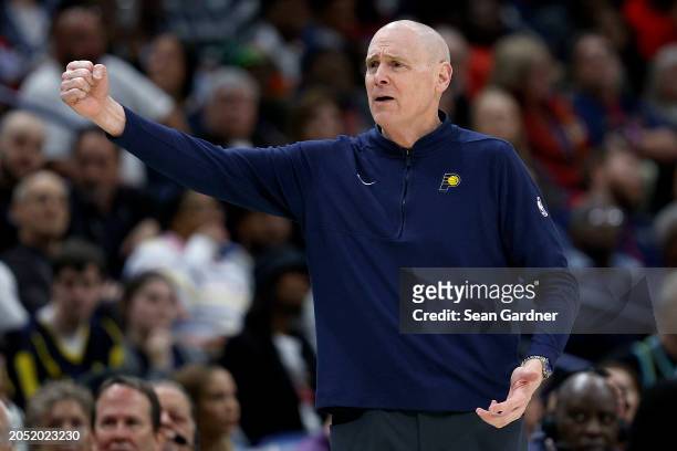 Indiana Pacers head coach Rick Carlisle stands on the court during the third quarter of an NBA game against the New Orleans Pelicans at Smoothie King...