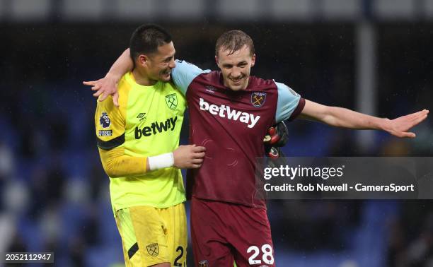 West Ham United's Alphonse Areola and Tomas Soucek celebrate at the end of the match during the Premier League match between Everton FC and West Ham...