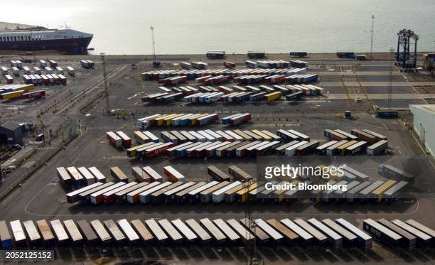 Shipping containers on the dockside at the Port of Felixstowe, owned by a unit of CK Hutchison Holdings Ltd., in Felixstowe, UK, on Monday, March 4,...