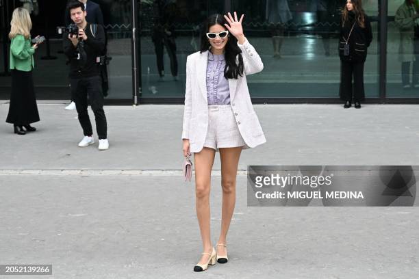 Peruvian model Juana Burga arrives for the presentation of creations by Chanel for the Women Ready-to-wear Fall-Winter 2024/2025 collection as part...