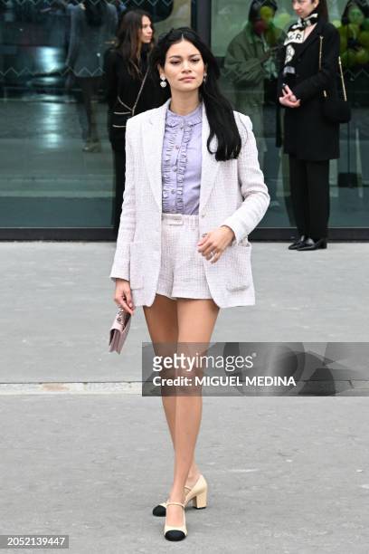 Peruvian model Juana Burga arrives for the presentation of creations by Chanel for the Women Ready-to-wear Fall-Winter 2024/2025 collection as part...