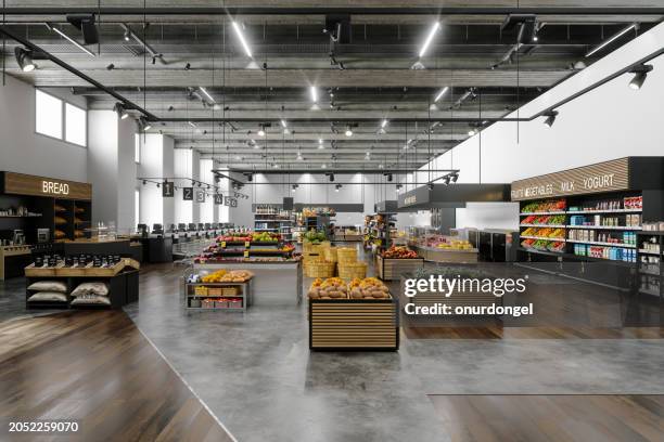 front view of supermarket with empty aisles and different products on shelves - supermarkt stockfoto's en -beelden