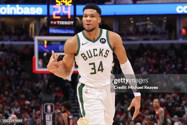 Giannis Antetokounmpo of the Milwaukee Bucks celebrates a three pointer against the Chicago Bulls during the second half at the United Center on...