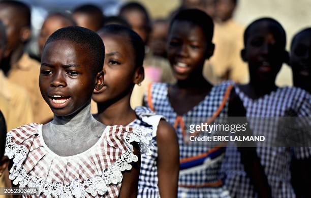 Children host a welcoming party at a visit of the Belgian Queen to the Mamie Faitai preschool in Yopougon, Yop City, a suburb of Abidjan, Ivory Coast...