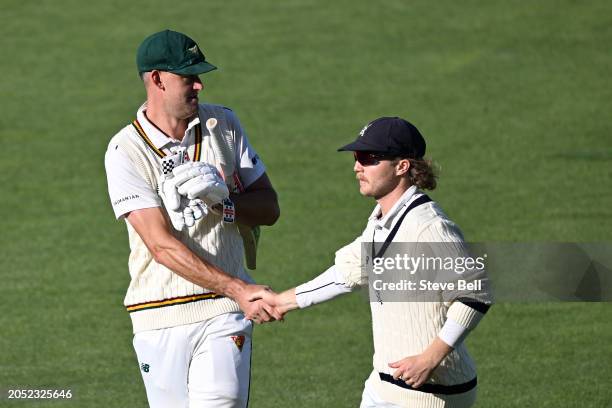 Beau Webster of the Tigers is congratulated by Will Pucovski of the Bushrangers on his unbeaten innings of 167 runs during the Sheffield Shield match...