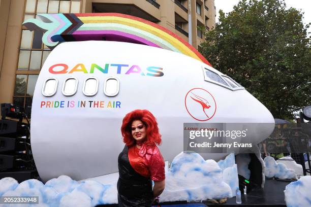 Parade goer stands in front of the QANTAS float ahead of the Sydney Gay & Lesbian Mardi Gras Parade on March 02, 2024 in Sydney, Australia. The...