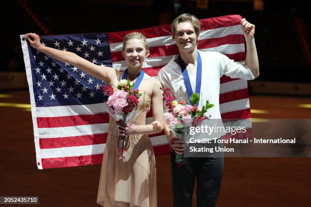 Gold medalists Leah Neset and Artem Markelov of United States pose at the medal ceremony after the Junior Ice Dance Free Dance during the ISU World...