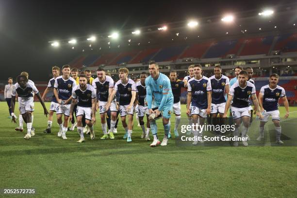 Mariners players celebrate with the F3 Derby Trophy during the A-League Men round 19 match between Central Coast Mariners and Newcastle Jets at...