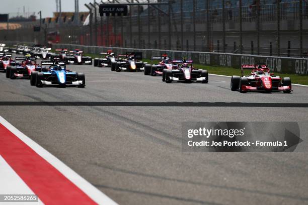 Dino Beganovic of Sweden and PREMA Racing and Luke Browning of Great Britain and Hitech Pulse-Eight lead the field off the line at the start during...