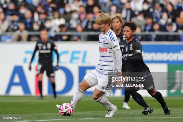 Albirex Niigata Player in action during the J.LEAGUE MEIJI YASUDA J1 2nd Sec. Match between Gamba Osaka and Albirex Niigata at Panasonic Stadium...