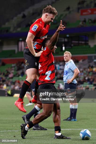 Sevu Reece of the Crusaders celebrates a try during the round two Super Rugby Pacific match between Crusaders and NSW Waratahs at AAMI Park, on March...