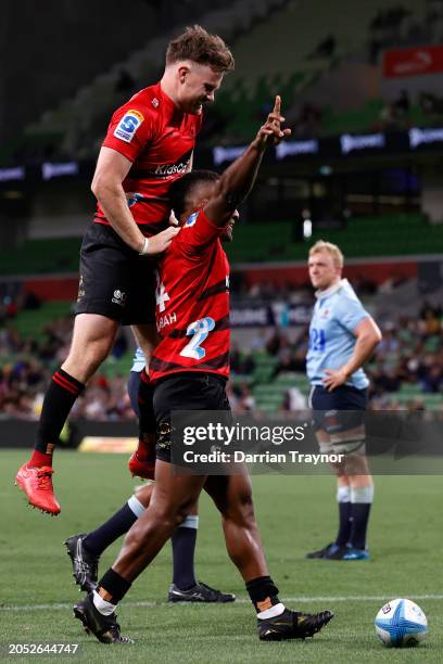 Sevu Reece of the Crusaders celebrates a try during the round two Super Rugby Pacific match between Crusaders and NSW Waratahs at AAMI Park, on March...