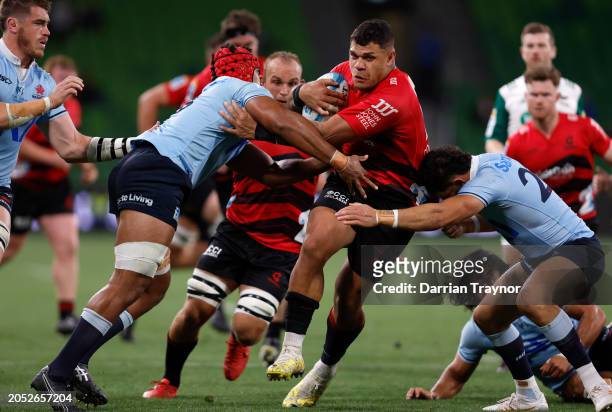 Levi Aumua of the Crusaders runs with the ball during the round two Super Rugby Pacific match between Crusaders and NSW Waratahs at AAMI Park, on...