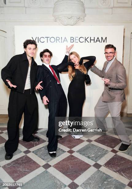 Brooklyn Beckham, Cruz Beckham, Harper Beckham and David Beckham arrive at the Victoria Beckham AW24 show during Paris Fashion Week on March 01, 2024...