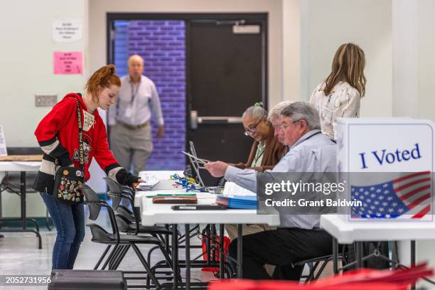 Voters arrive and check in on Super Tuesday at Mt. Moriah Primitive Baptist Church, Precinct 11 Mecklenburg County, on March 5, 2024 in Charlotte,...
