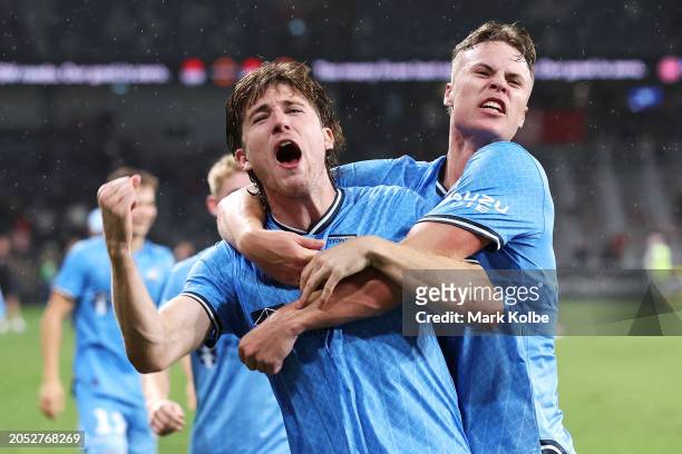 Max Burgess and Jake Girdwood-Reich of Sydney FC celebrate victory during the A-League Men round 19 match between Western Sydney Wanderers and Sydney...