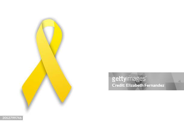 yellow awareness ribbon - military badge stock pictures, royalty-free photos & images