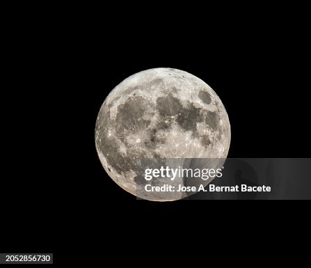 Full moon over a dark sky. Full moon over a dark sky.