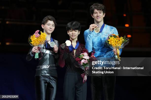 Silver medalist Rio Nakata of Japan, gold medalist Minkyu Seo of South Korea and bronze medalist Adam Hagara of Slovakia pose at the medal ceremony...