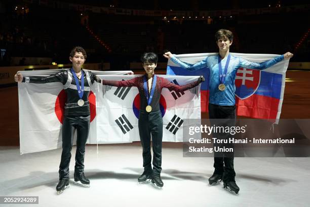 Silver medalist Rio Nakata of Japan, gold medalist Minkyu Seo of South Korea and bronze medalist Adam Hagara of Slovakia pose at the medal ceremony...