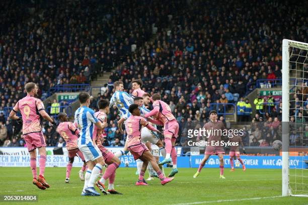 Michal Helik of Huddersfield Town scores his team's first goal during the Sky Bet Championship match between Huddersfield Town and Leeds United at...