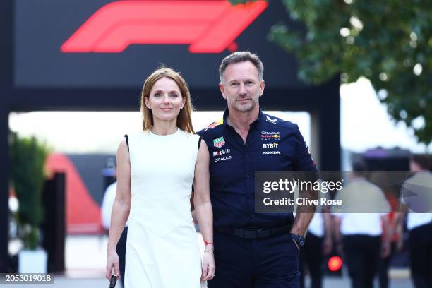 Oracle Red Bull Racing Team Principal Christian Horner and Geri Horner walk in the Paddock holding hands prior to the F1 Grand Prix of Bahrain at...