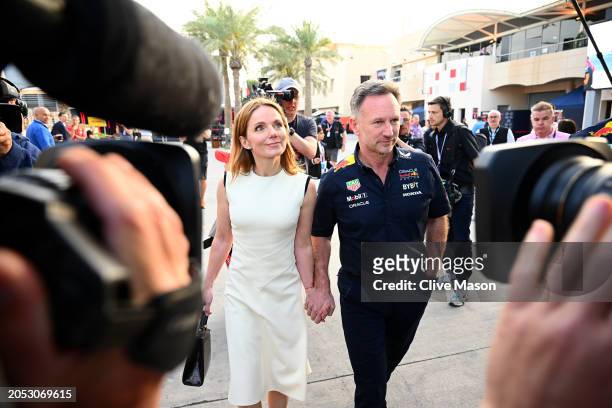 Oracle Red Bull Racing Team Principal Christian Horner and Geri Horner walk in the Paddock holding hands prior to the F1 Grand Prix of Bahrain at...