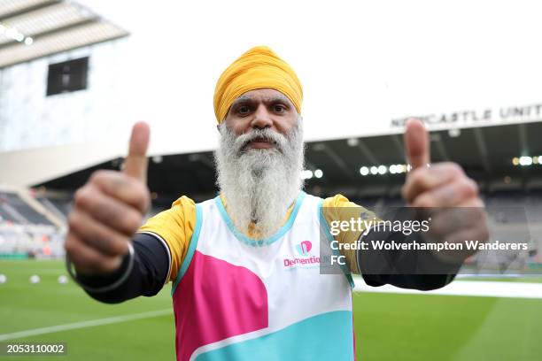 Manny Singh Kang poses for a photograph on the inside of the the stadium, after completing his walk from Wolverhampton to Newcaslte to raise funds...