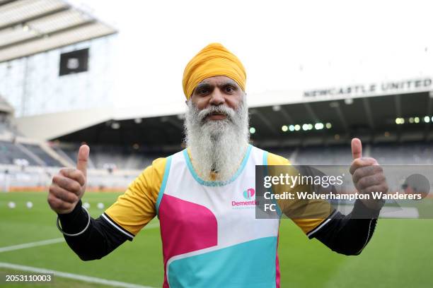 Manny Singh Kang poses for a photograph on the inside of the the stadium, after completing his walk from Wolverhampton to Newcaslte to raise funds...