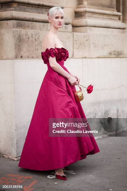 Lara Cosima Henckel von Donnersmarck wears fuchsia maxi dress with roses details on the top part, outside Giambattista Valli, during the Womenswear...