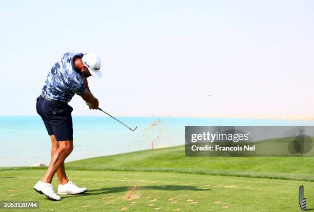 Dustin Johnson of 4Aces plays his tee shot on the 16th hole during day two of the LIV Golf Invitational - Jeddah at Royal Greens Golf & Country Club...