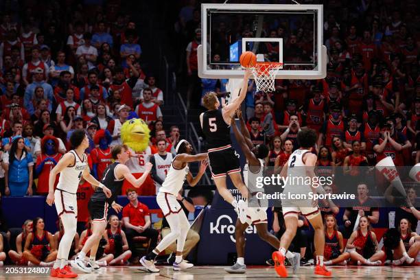 Davidson Wildcats guard Grant Huffman shoots the ball during the game against the Davidson Wildcats and the Dayton Flyers on February 27 at UD Arena...