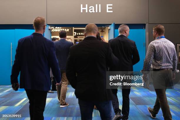 Attendees enter one of the exhibit halls during the Prospectors & Developers Association of Canada conference in Toronto, Ontario, Canada, on Monday,...