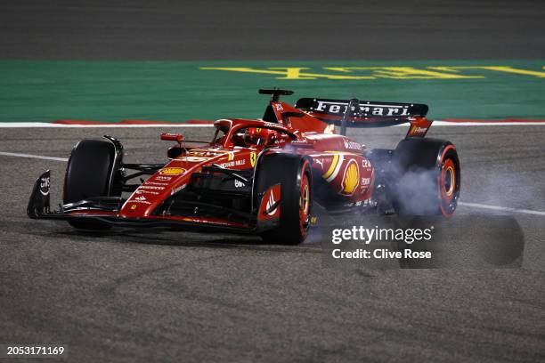 Charles Leclerc of Monaco driving the Ferrari SF-24 locks a wheel under braking during the F1 Grand Prix of Bahrain at Bahrain International Circuit...