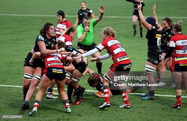 Emily Tuttosi of Exeter Chiefs scores her team's first try during the Allianz Premiership Women's Rugby match between Gloucester-Hartpury and Exeter...