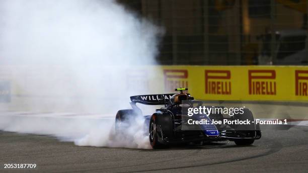 Logan Sargeant of United States driving the Williams FW46 Mercedes locks a wheel under braking during the F1 Grand Prix of Bahrain at Bahrain...