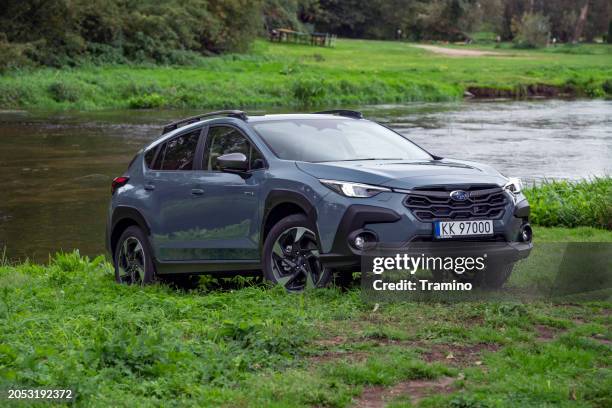 subaru crosstrek next to the river - subaru stock pictures, royalty-free photos & images
