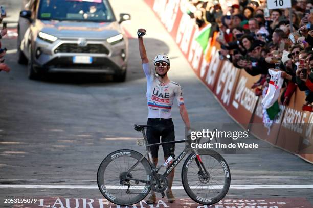 Tadej Pogacar of Slovenia and UAE Team Emirates celebrates at finish line as race winner during the 18th Strade Bianche 2024, Men's Elite a 215km one...