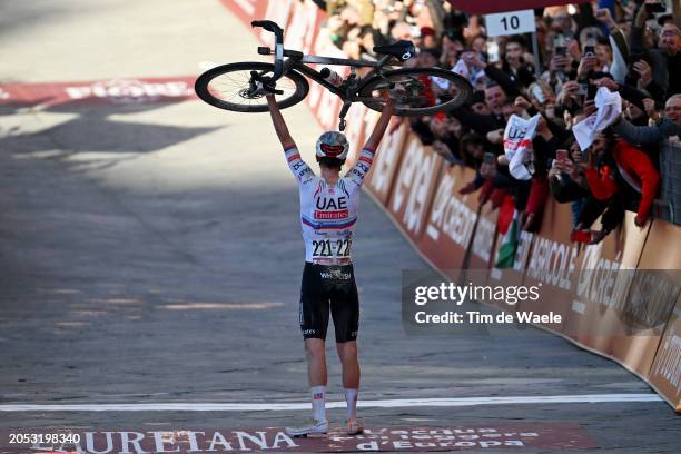 Tadej Pogacar of Slovenia and UAE Team Emirates celebrates at finish line as race winner during the 18th Strade Bianche 2024, Men's Elite a 215km one...