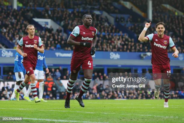 Kurt Zouma of West Ham United celebrates scoring his team's first goal with teammates Tomas Soucek and Konstantinos Mavropano during the Premier...