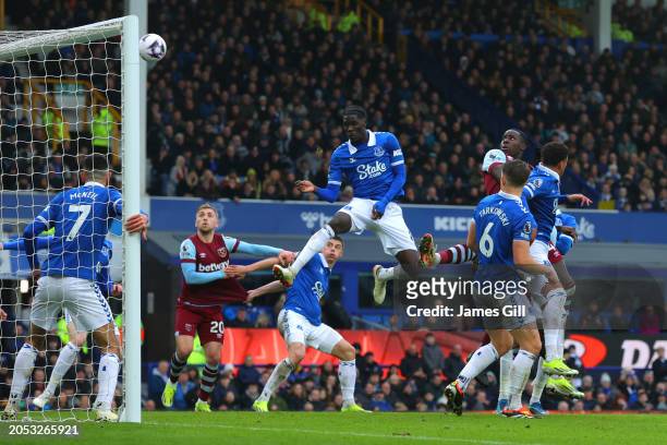 Kurt Zouma of West Ham United scores his team's first goal during the Premier League match between Everton FC and West Ham United at Goodison Park on...