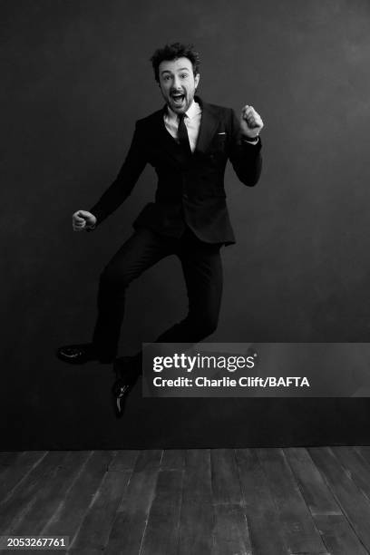 Television presenter Alex Zane is photographed backstage at the 2024 EE BAFTA Film Awards, held at The Royal Festival Hall on February 18, 2024 in...