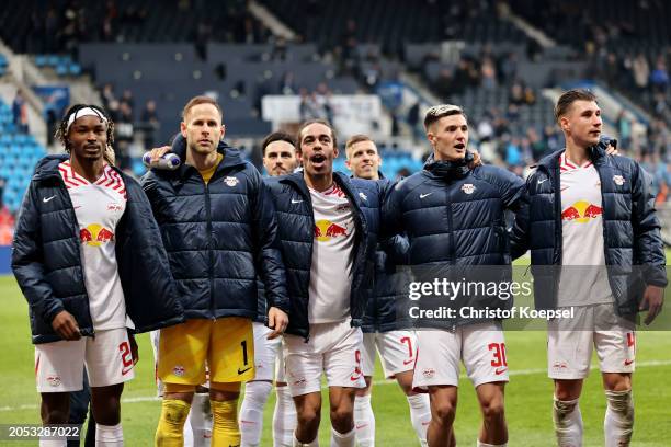 Mohamed Simakan, Peter Gulacsi, Yussuf Poulsen, Benjamin Sesko and Willi Orban of RB Leipzig celebrates following the team's victory in during the...