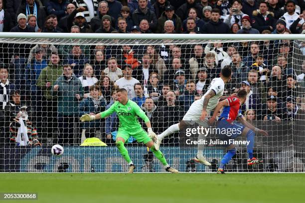 Cristian Romero of Tottenham Hotspur scores his team's second goal past Sam Johnstone of Crystal Palace during the Premier League match between...
