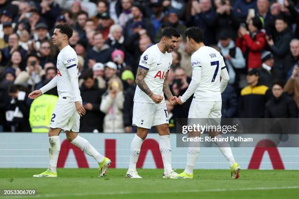 Son Heung-Min of Tottenham Hotspur celebrates with team mate Cristian Romero after scoring his team's third goal during the Premier League match...