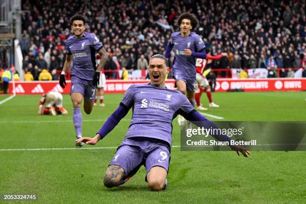 Darwin Nunez of Liverpool celebrates scoring his team's first goal during the Premier League match between Nottingham Forest and Liverpool FC at the...