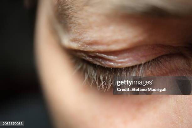 eye closed, reflect feeling - augenlid stock-fotos und bilder